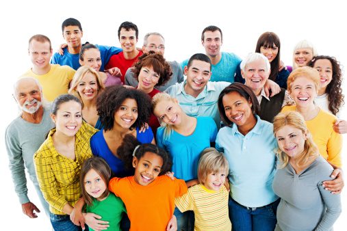 Portrait of a large group of a Mixed Age people smiling and embracing together.